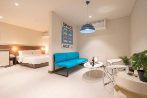 Postelja oz. postelje v sobi nastanitve TimeTerminal Hotel Daejeon 1st by Aank