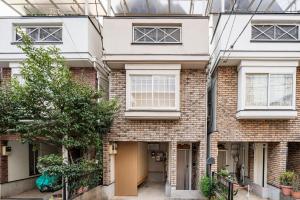 an image of a brick house at Hotel STAY ARI Higashishinjuku in Tokyo