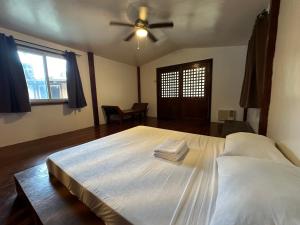 Postel nebo postele na pokoji v ubytování Tribal Xperience Guesthouse