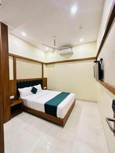 Postel nebo postele na pokoji v ubytování HOTEL BKC DOWNTOWN - NEAR US EMBASSY