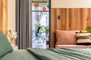 Postel nebo postele na pokoji v ubytování Skycure Serviced Apartments