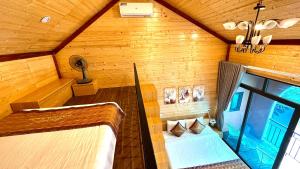 an overhead view of a bedroom in a house at LePont Cat Ba Bungalow in Cat Ba