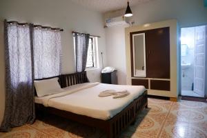 Легло или легла в стая в Altrude Villa Guest House Near Candolim Beach
