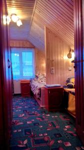Postel nebo postele na pokoji v ubytování Cottage Ozerniy