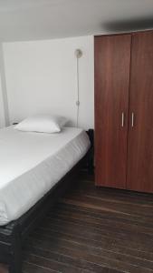 Postel nebo postele na pokoji v ubytování Habitación sencilla y central #6