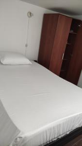 Postel nebo postele na pokoji v ubytování Habitación sencilla y central #6
