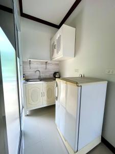 Kuchyň nebo kuchyňský kout v ubytování Tan Residence