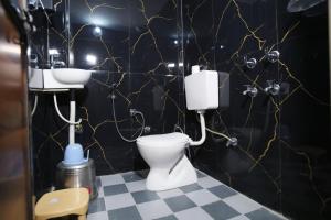 Baðherbergi á Signature Inn Orchha