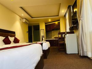 Letto o letti in una camera di Hotel de Universal