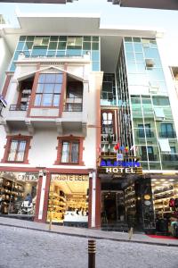 a store front of a hotel on a city street at Alpinn Hotel Istanbul in Istanbul