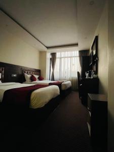 Letto o letti in una camera di Hotel de Universal