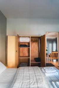 a bedroom with a bunk bed and a room at Ba & Bu Apartment 1 in Katerini