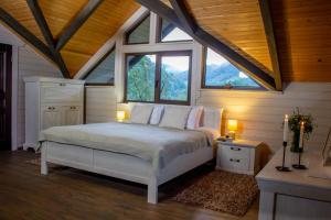 Postel nebo postele na pokoji v ubytování BRB Park Hotel