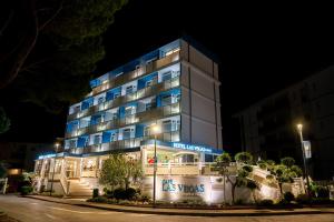 a building with a sign on the front of it at Hotel Las Vegas in Bibione