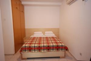 Postel nebo postele na pokoji v ubytování Springs Apartments & Rooms