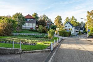 a street in a residential neighborhood with houses at Rebenhaus Loft in Baden-Baden