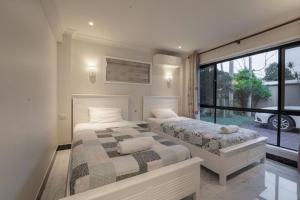Ένα ή περισσότερα κρεβάτια σε δωμάτιο στο Luxury Living 2 Bedrooms 4 Beds 2B athrooms in Southern Brisbane+ Parking