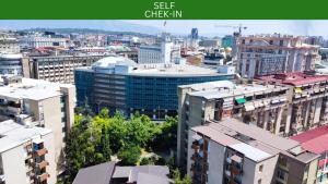 a view of a city with tall buildings at Sky view luxury Center Skopje apartments in Skopje