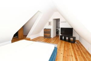 Llit o llits en una habitació de Ferienwohnung-Weitblick