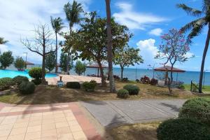 a resort with a view of the ocean at Hidden Gem: Cebu's Best Escape in Talisay