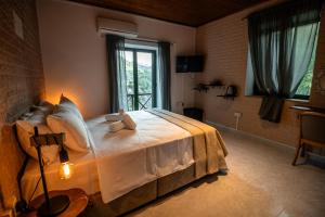 Postel nebo postele na pokoji v ubytování Pine View Boutique Hotel Adults Only