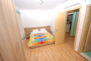 Postel nebo postele na pokoji v ubytování Springs Apartments & Rooms