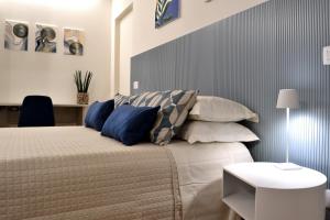 Letto o letti in una camera di B&B Case Bianche