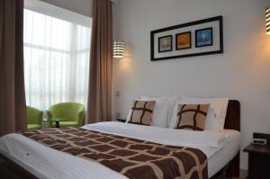 Katil atau katil-katil dalam bilik di Hotel Zeder Garni