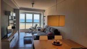 Posezení v ubytování Egona - Bañeru 3 Vivienda en 1 línea de playa centro ciudad