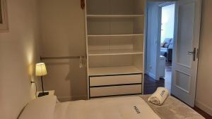 Postel nebo postele na pokoji v ubytování Egona - Bañeru 3 Vivienda en 1 línea de playa centro ciudad