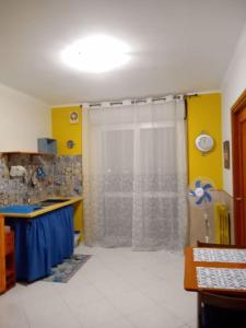 a bathroom with a shower with a shower curtain at Dreaming Vesuvio Napoli in Naples