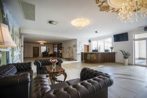 Televiisor ja/või meelelahutuskeskus majutusasutuses Hotel Kiston