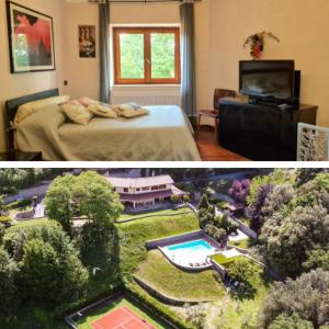 una camera con letto e un giardino in miniatura di Villa Carolina - Piscina e Parco panoramico a Campagnano di Roma