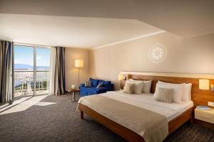 Postel nebo postele na pokoji v ubytování Valamar Sanfior Hotel & Casa + 35 fotografií