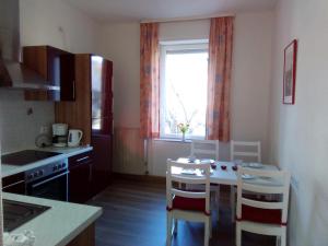 Kuchyň nebo kuchyňský kout v ubytování Weingut-Ferienwohnung Heinz Dostert + 7 fotografií
