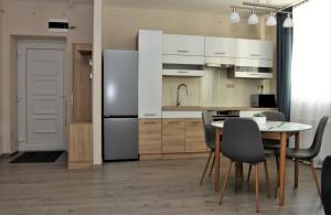 Kuchyň nebo kuchyňský kout v ubytování Ózon Apartman