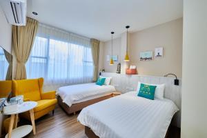 Una cama o camas en una habitación de Warmday Homestel