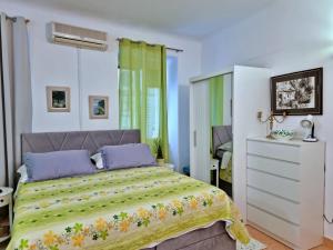 Ένα ή περισσότερα κρεβάτια σε δωμάτιο στο Heart of Omis - Green