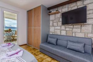 Μια τηλεόραση ή/και κέντρο ψυχαγωγίας στο Apartments Bety