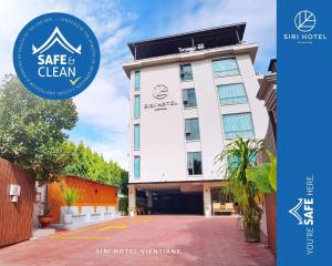 a hotel with the star clean sign in front of it at Siri Hotel in Vientiane