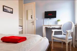 Postel nebo postele na pokoji v ubytování Blue House B&B