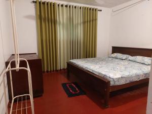 Postelja oz. postelje v sobi nastanitve Shani Residence