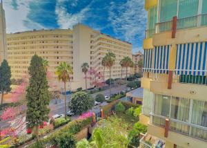 an aerial view of a city with a building at Modern Renovated One Bed Apartment in Edificio Apolo Marbella Center in Marbella