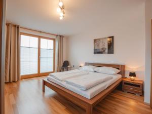 Posteľ alebo postele v izbe v ubytovaní Apartment Hüttaler by Interhome