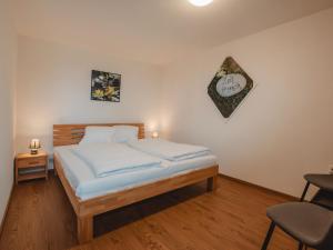 Posteľ alebo postele v izbe v ubytovaní Apartment Hüttaler by Interhome