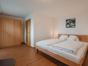 Posteľ alebo postele v izbe v ubytovaní Apartment Hüttaler by Interhome