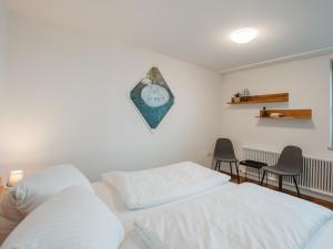 Posteľ alebo postele v izbe v ubytovaní Apartment Hüttaler by Interhome