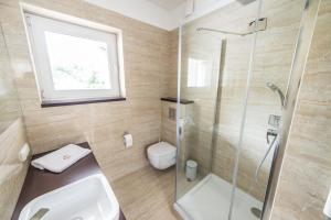 Um banheiro em Silver One Apartments