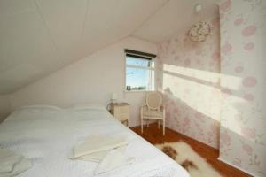 Postel nebo postele na pokoji v ubytování Blue House B&B