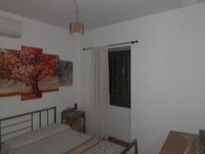 מיטה או מיטות בחדר ב-Casa de Mirasierra